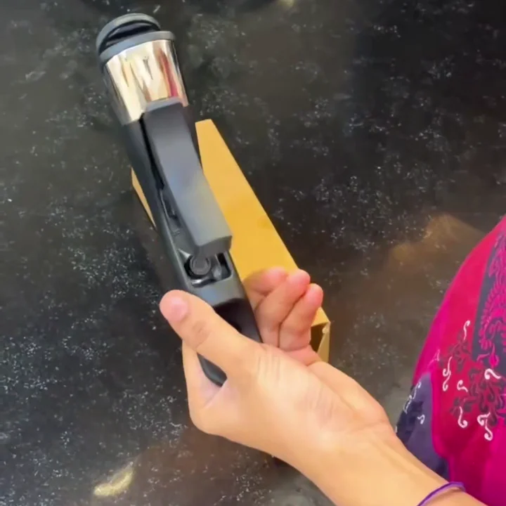 Black detachable pan handle — view 1